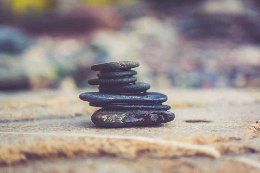 Stacked stones. Photo by Aperture Vintage on Unsplash